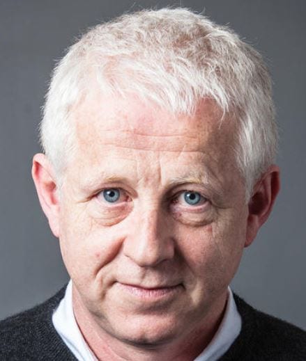 Richard Curtis looks at the camera